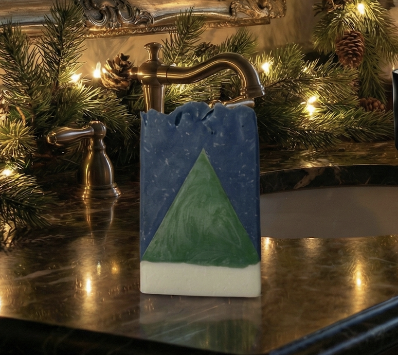 A bar of soap sitting on a bathroom sink